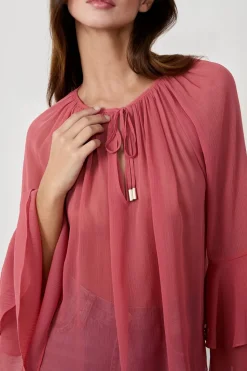 Blusa con mangas de volantes