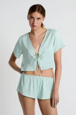 Blusa satinada de manga corta estampada con lazos