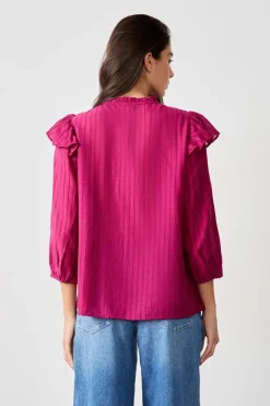 Camisa de manga larga con volantes