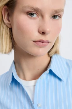 Camisa de manga larga de algodón con cinturón