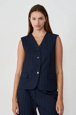 Chaleco sin mangas con botones