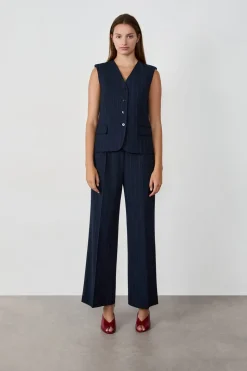 Chaleco sin mangas con botones