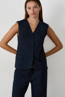 Chaleco sin mangas con botones