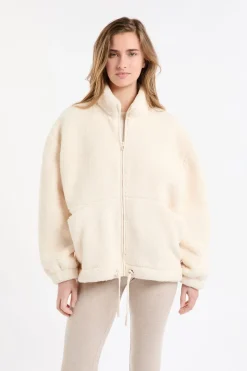 Chaqueta polar oversize con cuello alto y cordón