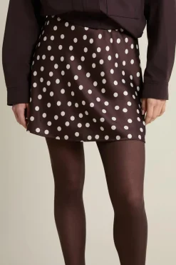 Jupe courte satinée à pois