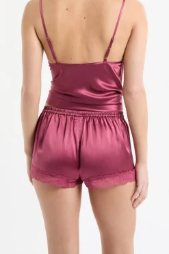 Pantalón corto de seda con detalles de encaje