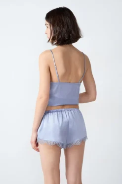 Pantalón corto de seda con detalle de encaje