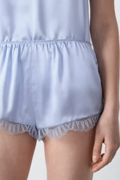 Pantalón corto de seda con detalle de encaje