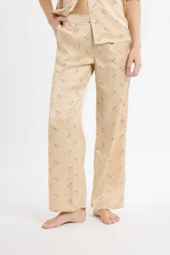 Pantalón de pijama de satén con estampado de perros