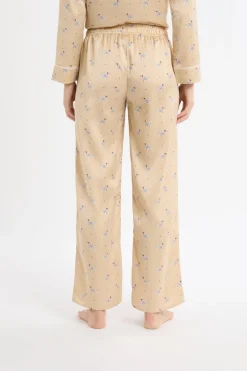 Pantalón de pijama de satén con estampado de perros