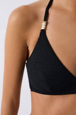 Top bikini triangular detalles perlas