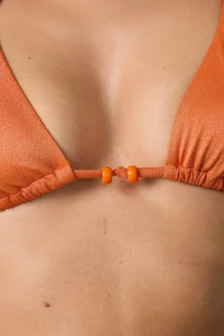 Top bikini triangular detalle perla