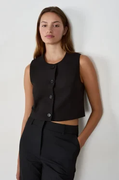 Top corto sin mangas con botones