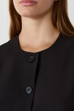 Top corto sin mangas con botones