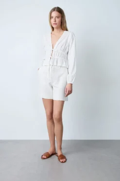 Top de manga larga de algodón con lazos