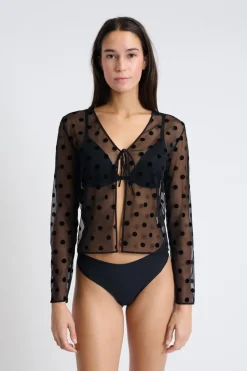 Top transparente de manga larga